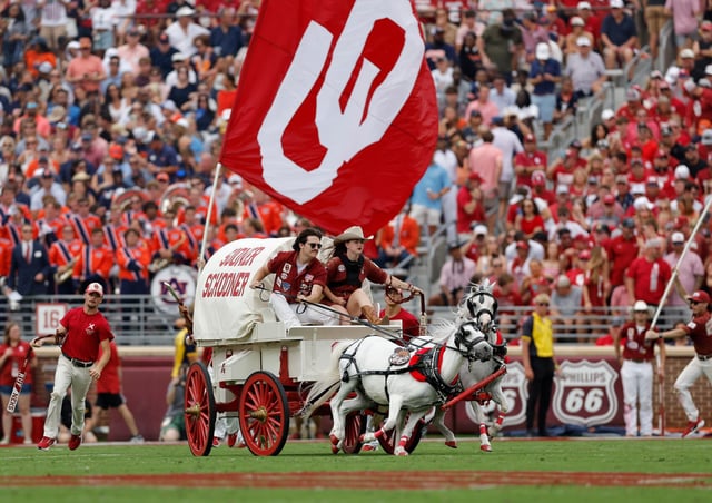 The Oklahoma Sooner Schooner pulled by ponies Boomer and Sooner ride onto the field after an Oklahoma score against Auburn during the first half of an NCAA college football game Saturday, Sept. 20, 2025, in Norman, Okla. (AP Photo/Alonzo Adams)