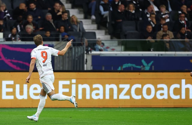 Soccer Football - Bundesliga - Eintracht Frankfurt v Bayern Munich - Deutsche Bank Park, Frankfurt, Germany - October 4, 2025 Bayern Munich's Harry Kane celebrates scoring their second goal REUTERS/Kai Pfaffenbach