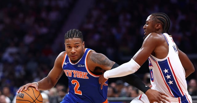 ABU DHABI, UNITED ARAB EMIRATES - OCTOBER 04: Miles McBride of New York Knick dribbles the ball against Tyrese Maxey #0 of Philadelphia 76ers during a preseason game between Philadelphia 76ers and New York Knicks on October 04, 2025 in Abu Dhabi, United Arab Emirates. (Photo by Francois Nel / Getty Images)