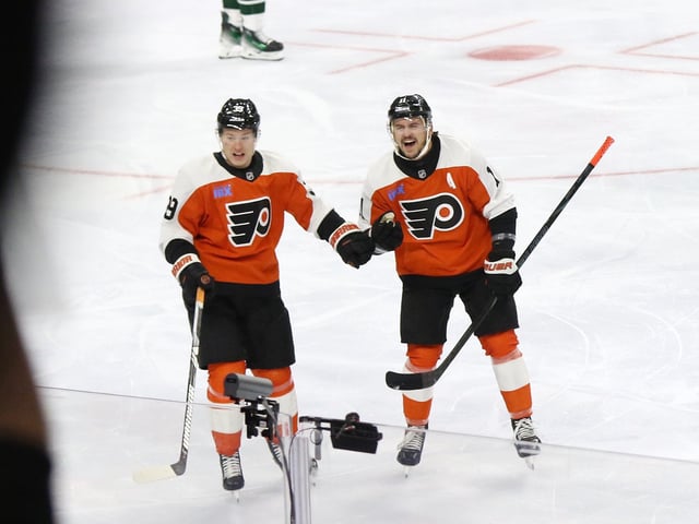 Travis Konecny and Matvei Michkov celebrate a goal for the Philadelphia Flyers (Amy Irvin / The Hockey Writers)