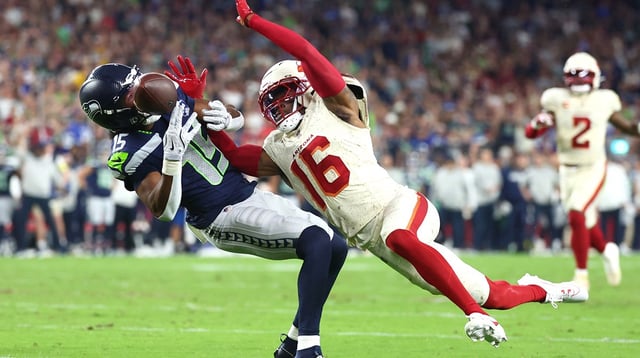 Sep 25, 2025; Glendale, Arizona, USA; Seattle Seahawks wide receiver Tory Horton (15) cannot make a catch against Arizona Cardinals cornerback Max Melton (16) in the second quarter at State Farm Stadium. Mandatory Credit: Mark J. Rebilas-Imagn Images