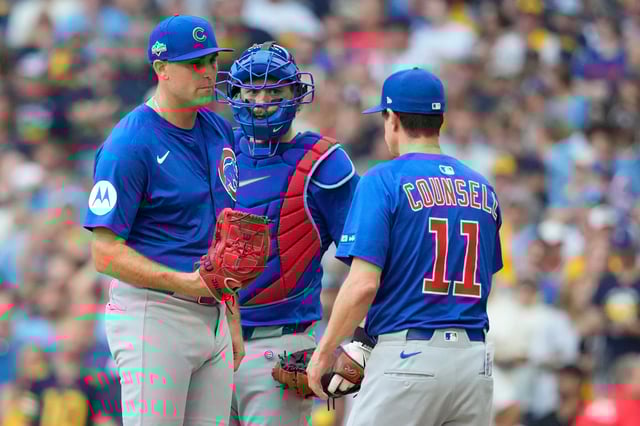 MILWAUKEE, WISCONSIN - OCTOBER 04: Manager Craig Counsell #11 of the Chicago Cubs pulls Matthew Boyd #16 from the game during the first inning against the Milwaukee Brewers in game one of the Division Series at American Family Field on October 04, 2025 in Milwaukee, Wisconsin. (Photo by John Fisher/Getty Images)