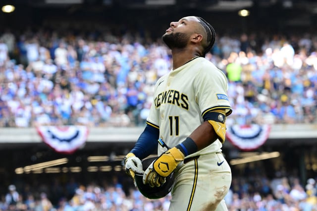 Oct 4, 2025; Milwaukee, Wisconsin, USA; Milwaukee Brewers left fielder Jackson Chourio (11) leaves the game after an apparent injury during the second inning of game one of the NLDS round for the 2025 MLB playoffs at American Family Field. Mandatory Credit: Benny Sieu-Imagn Images