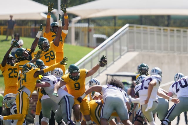 Oct 4, 2025; Waco, Texas, USA; Baylor Bears defensive lineman Cooper Lanz (9) blocks a field goal attempt by Kansas State Wildcats quarterback Blake Barnett (13) at the end of the second half at McLane Stadium. Mandatory Credit: Chris Jones-Imagn Images