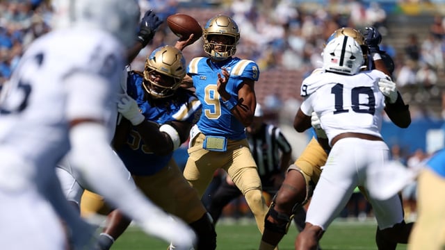 UCLA Bruins quarterback Nico Iamaleava (9) looks to pass during the first quarter against the Penn State Nittany Lions at Rose Bowl. Mandatory Credit: Kiyoshi Mio-Imagn Images