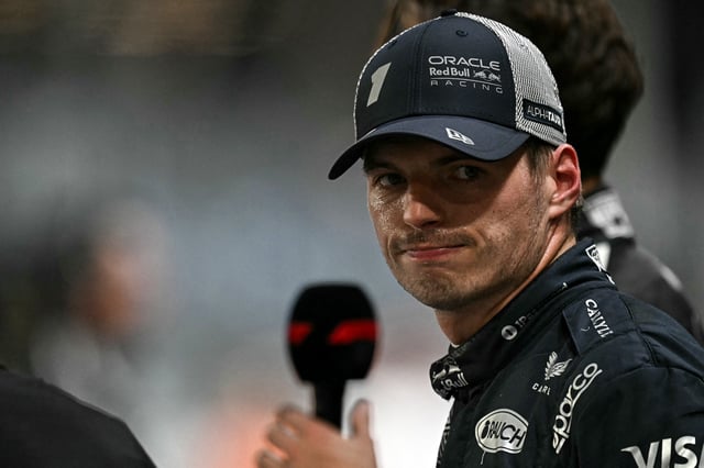 Second-placed Red Bull Racing's Dutch driver Max Verstappen looks on after the qualifying session for the Formula One Singapore Grand Prix night race at the Marina Bay Street Circuit in Singapore on October 4, 2025. (Photo by Lillian SUWANRUMPHA / AFP) (Photo by LILLIAN SUWANRUMPHA/AFP via Getty Images)