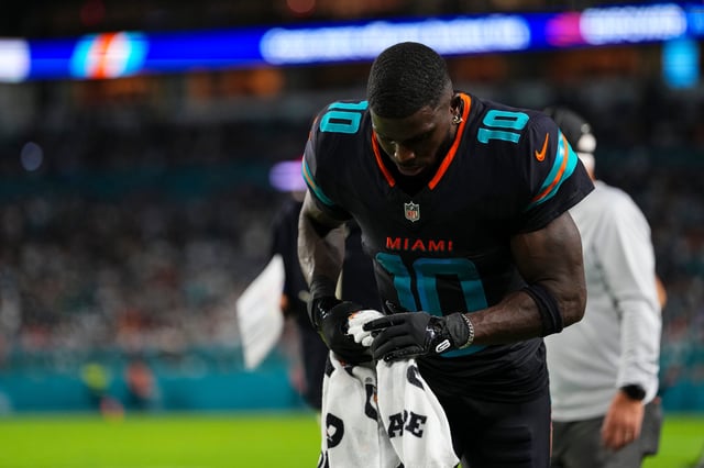 MIAMI GARDENS, FL - SEPTEMBER 29: Tyreek Hill#10 of the Miami Dolphins runs off of the field at halftime during an NFL football game against the New York Jets at Hard Rock Stadium on September 29, 2025 in Miami Gardens, Florida. (Photo by Cooper Neill/Getty Images)