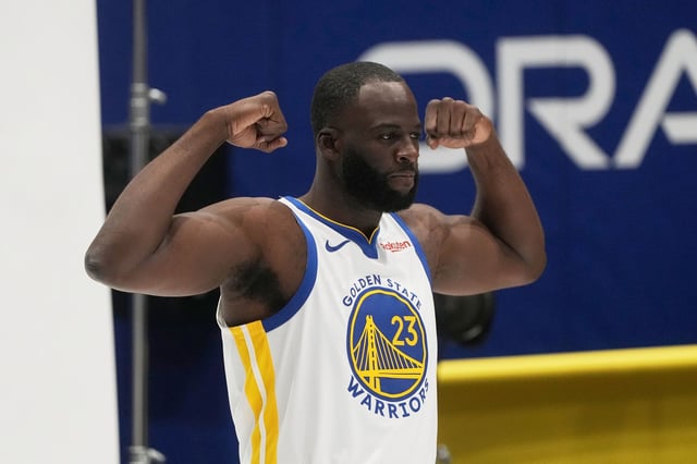 Golden State Warriors forward Draymond Green poses for photos during the NBA basketball team's media day in San Francisco, Monday, Sept. 29, 2025.