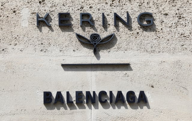 The logos of French luxury group Kering and fashion house Balenciaga are pictured on Kering headquarters in Paris, France, April 20, 2020.  REUTERS/Charles Platiau