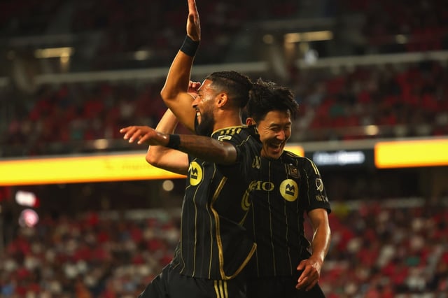 LAFC’s Denis Bouanga, left, celebrates with Son Heung-Min Son after scoring a goal against St. Louis City in the first half Sept. 27, 2025, in St Louis, Missouri. (Photo by Dilip Vishwanat/Getty Images)