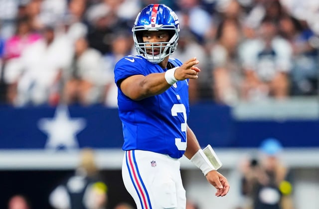 Russell Wilson #3 of the New York Giants reacts after a play against the Dallas Cowboys during the first half of an NFL football game at AT&T Field on September 14, 2025 in Arlington, Texas.