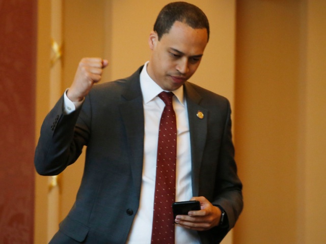 In this March 4, 2020 file photo Del. Jay Jones, D-Norfolk, reacts to the passage of a bill relating to electric utility at the Capitol in Richmond, Va. Jones sponsored a bill, passed by the Senate, calling for the removal of a statue of former Sen. Harry Byrd, a staunch segregationist, from the Capitol grounds. (AP Photo/Steve Helber)