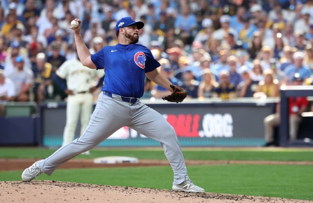 Chicago Cubs relief pitcher Aaron Civale (38) delivers to the Milwaukee Brewers in the fourth inning of the NL Division Series Game 1 at American Family Field in Milwaukee on Oct. 4, 2025. (Chris Sweda/Chicago Tribune)