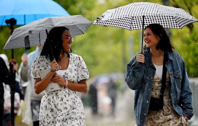 Abigail Mendez of New York and Lauren Tait of Florida laugh and talk as they join other conferenc goers making their way into the Conference Center in Salt Lake City on Saturday, Oct. 4, 2025, for the Saturday morning session of the 195th Semiannual General Conference of The Church of Jesus Christ of Latter-day Saints.