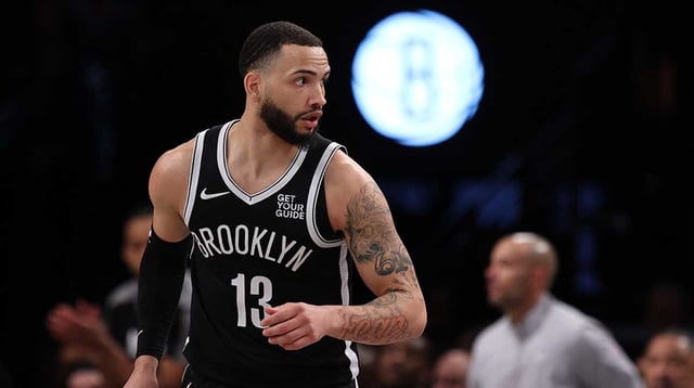 Apr 13, 2025; Brooklyn, New York, USA; Brooklyn Nets guard Tyrese Martin (13) reacts after a basket against the New York Knicks during the first half at Barclays Center. Mandatory Credit: Vincent Carchietta-Imagn Images