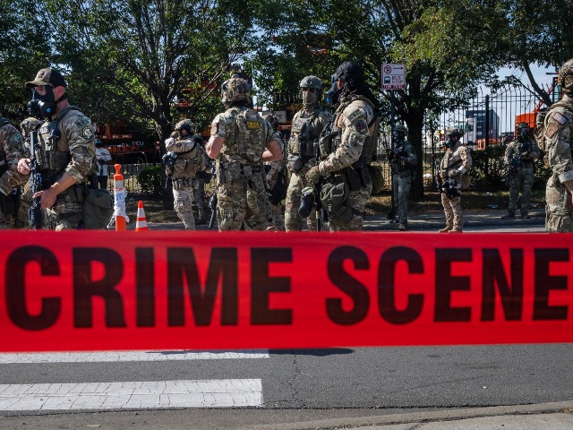 CHICAGO, ILLINOIS - OCTOBER 04: Federal law enforcement agents are confronted by community members and activists for reportedly shooting a woman in the Brighton Park neighborhood on October 04, 2025 in Broadview, Illinois. Residents of the city have become increasingly concerned as Operation Midway Blitz continues in the Chicago area, an operation designed to apprehend and deport undocumented immigrants living in the area. (Photo by Scott Olson/Getty Images)