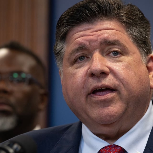 CHICAGO, ILLINOIS - SEPTEMBER 02: Illinois Governor JB Pritzker speaks to the press as Chicago Mayor Brandon Johnson listens on September 02, 2025 in Chicago, Illinois. They called the press conference to address President Donald Trump's threat to bring the National Guard and an influx of ICE agents into the city to help control crime. (Photo by Scott Olson/Getty Images)