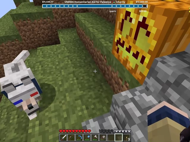 kurtmac and his dog, Wolfie, walk toward the Far Lands