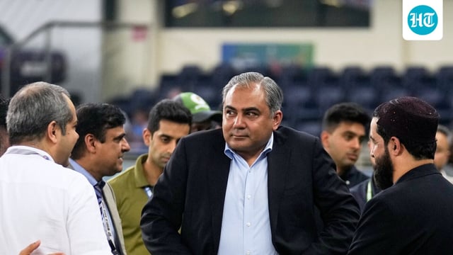 Mohsin Naqvi stands with officials on the field after India won the Asia Cup.