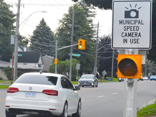 Speed-camera signs posted in the Sidney Street Community Safety Zone between College Street and Tracey Street in Belleville to advise people speed cameras are now monitoring local traffic. Cars clocked by the cameras doing more than the 40-km/h speed limit will be photographed and fines issued at a higher cost than normal speeding provisions set by the city. (Derek Baldwin/Postmedia Network)