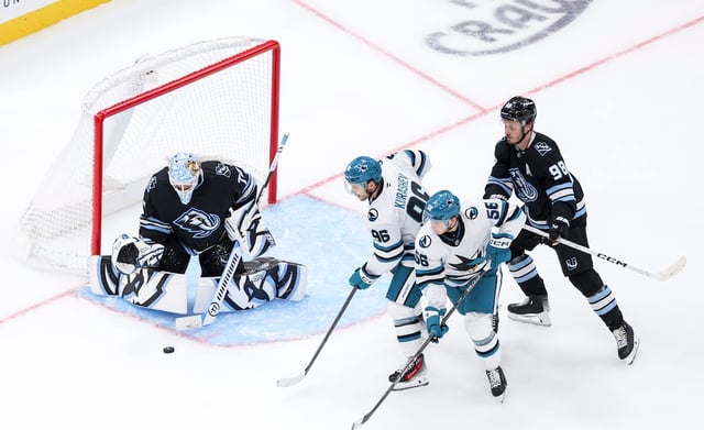 Utah Mammoth goaltender Karel Vejmelka (70) watches the puck during the third period of a preseason NHL game against the San Jose Sharks at the Delta Center in Salt Lake City on Saturday, Oct. 4, 2025.