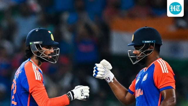 Tilak Varma and Sanju Samson bump their fists during the Asia Cup 2025.