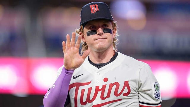 Jul 26, 2025; Minneapolis, Minnesota, USA; Minnesota Twins left fielder Harrison Bader (12) waves at a fan while walking to the dugout after the ninth inning against the Washington Nationals at Target Field. Mandatory Credit: Matt Blewett-Imagn Images
