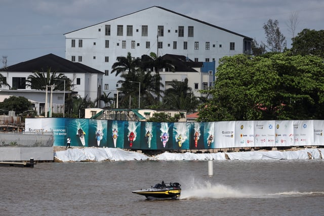 An E1 powerboat races across the Lagos lagoon during the qualifying time trial of the E1 Lagos GP powerboat championship debut in Lagos, Nigeria, October 4, 2025. REUTERS/Sodiq Adelakun