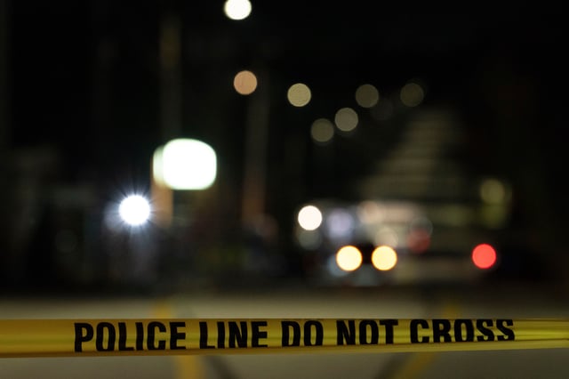 File photo of police tape cordoning off the road, taken in Maine, in October 2023.