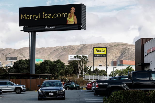 Lisa Catalano purchased space on Bay Area billboards to help her find a husband. This one is located on the northbound side of Highway 101 in South San Francisco.