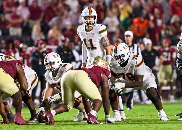 David Lebowitz, Staff Photographer - Quarterback Carson Beck leads the Hurricanes to a 28-22 win over FSU on Oct. 4 2025