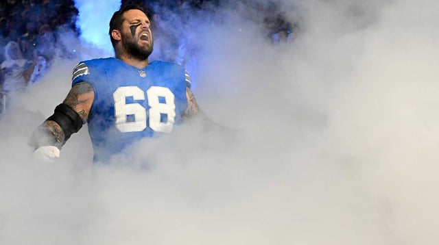 Sep 14, 2025; Detroit, Michigan, USA; Detroit Lions offensive tackle Taylor Decker (68) runs onto the field prior to the game against the Chicago Bears at Ford Field. Mandatory Credit: Lon Horwedel-Imagn Images