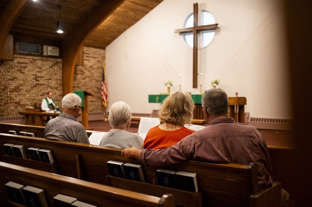 Community members gather for a prayer service at Gloria Dei Lutheran Church on September 29, in Grand Blanc, Michigan.