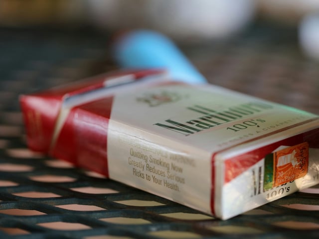 photo of cigarettes, marlboro, cigarette pack, and grey in Bridgewater, United States by David Trinks
