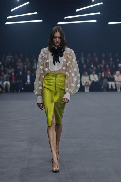 A model wears a creation as part of the Valentino Spring/Summer 2026 collection presented in Paris, Sunday, Oct. 5, 2025. (AP Photo/Aurelien Morissard)