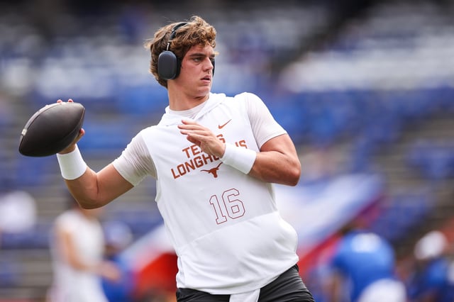 Arch Manning #16 of the Texas Longhorns warms up before the start of a game against the Florida Gators at Ben Hill Griffin Stadium on October 04, 2025 in Gainesville, Florida.