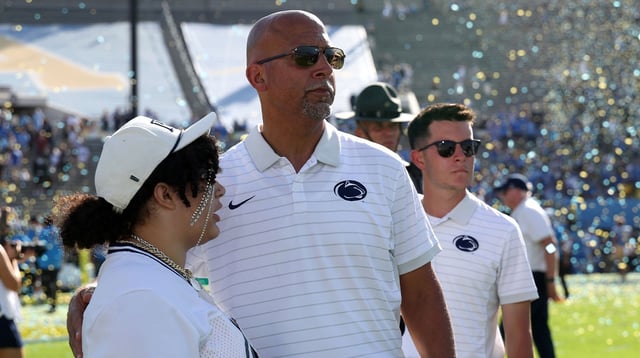 Oct 4, 2025; Pasadena, California, USA; Penn State Nittany Lions head coach James Franklin (middle) looks on after defeated by UCLA Bruins 42-37 at Rose Bowl. Mandatory Credit: Kiyoshi Mio-Imagn Images