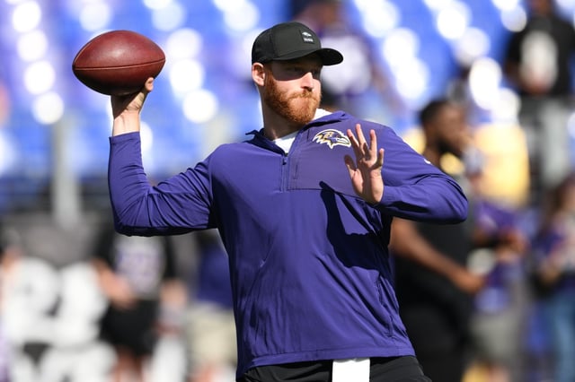 Baltimore Ravens quarterback Cooper Rush warms up before an NFL football game against the Houston Texans, Sunday, Oct. 5, 2025, in Baltimore. (AP Photo/Nick Wass)