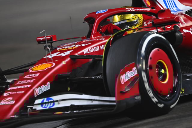 SINGAPORE, SINGAPORE - OCTOBER 05: Lewis Hamilton of Great Britain driving the (44) Scuderia Ferrari SF-25 on track during the F1 Grand Prix of Singapore at Marina Bay Street Circuit on October 05, 2025 in Singapore, Singapore. (Photo by Rudy Carezzevoli/Getty Images)
