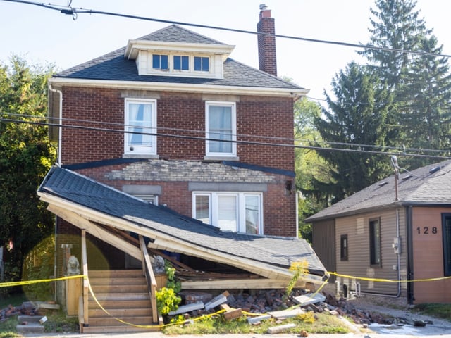 This house at 132 Adelaide St. was damaged after an SUV crashed into it in London. Photo taken on Sunday Oct. 5, 2025. Derek Ruttan/The London Free Press