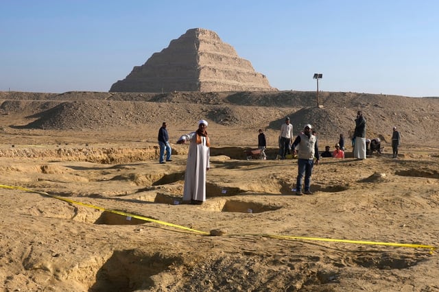 FILE - Egyptian antiquities workers dig at the site of the Step Pyramid of Djoser in Saqqara, 24 kms. (15 miles) southwest of Cairo, Jan. 26, 2023. (AP Photo/Amr Nabil, File)