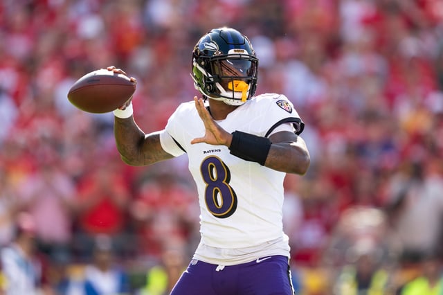 Lamar Jackson #8 of the Baltimore Ravens looks to pass during an NFL football game against the Kansas City Chiefs at GEHA Field at Arrowhead Stadium on September 28, 2025 in Kansas City, Missouri.