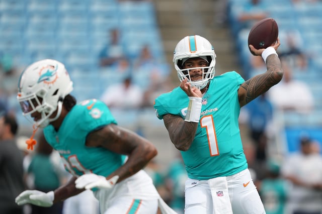 CHARLOTTE, NORTH CAROLINA - OCTOBER 05: Tua Tagovailoa #1 of the Miami Dolphins warms up prior to the game against the Carolina Panthers at Bank of America Stadium on October 05, 2025 in Charlotte, North Carolina. (Photo by Josh Lavallee/Getty Images)