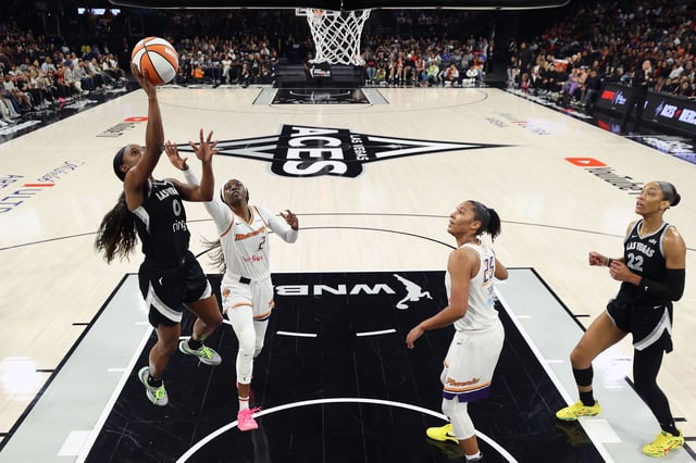 LAS VEGAS, NV - OCTOBER 5: Jackie Young #0 of the Las Vegas Aces drives to the basket during the game against the Phoenix Mercury during Game 2 of the 2025 WNBA Finals on October 5, 2025 at Michelob ULTRA Arena n Las Vegas, Nevada. NOTE TO USER: User expressly acknowledges and agrees that, by downloading and or using this photograph, User is consenting to the terms and conditions of the Getty Images License Agreement. Mandatory Copyright Notice: Copyright 2025 NBAE (Photo by Stephen Gosling/NBAE via Getty Images)
