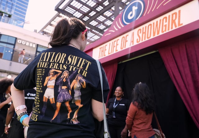 Taylor Swift fans await entry to a TikTok/Taylor Swift fan activation pop-up event to celebrate the release of her latest album "The Life of a Showgirl," on Friday, Oct. 3, 2025, in Los Angeles.