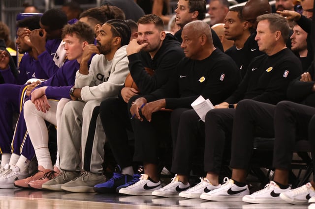 PALM SPRINGS, CALIFORNIA - OCTOBER 03: Luka Doncic #77 of the Los Angeles Lakers (C) looks on from the bench during a game between the Los Angeles Lakers and the Phoenix Suns at Acrisure Arena on October 03, 2025 in Palm Springs, California. NOTE TO USER: User expressly acknowledges and agrees that, by downloading and or using this photograph, User is consenting to the terms and conditions of the Getty Images License Agreement. (Photo by Katharine Lotze/Getty Images)