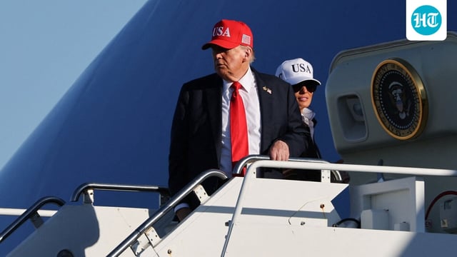 US President Donald Trump and first lady Melania Trump board Air Force One 