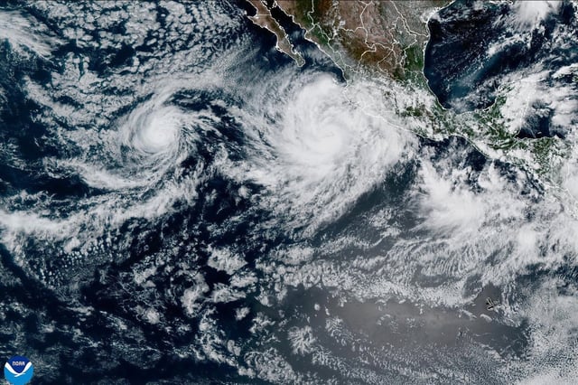 In this satellite image released by NOAA, Tropical Storm Priscilla forms in the easter Pacific off Mexico, Oct. 5, 2025.