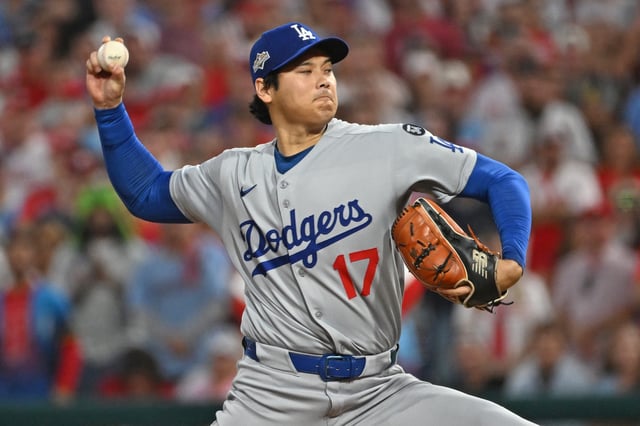 Oct 4, 2025; Philadelphia, Pennsylvania, USA; Los Angeles Dodgers two-way player Shohei Ohtani (17) throws a pitch during the first inning against the Philadelphia Phillies during game one of the NLDS round for the 2025 MLB playoffs at Citizens Bank Park. Mandatory Credit: Eric Hartline-Imagn Images
