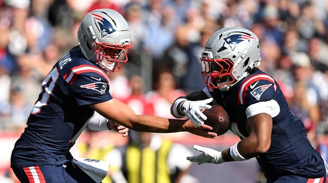 New England Patriots quarterback Drake Maye (10) hands the ball off to running back Antonio Gibson (4) during the second half of a game against the Carolina Panthers at Gillette Stadium. Mandatory Credit: Brian Fluharty-Imagn Images
